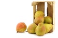 Fresh doyennÃÂ© de comice pears in a wooden crate Royalty Free Stock Photo