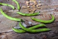 Fresh and dried broad beans in the wooden table Royalty Free Stock Photo