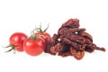 Fresh and dried tomatoes isolated on white background Royalty Free Stock Photo