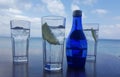 Fresh drinks against the bright blue sky and sea in Kos, Greece Royalty Free Stock Photo