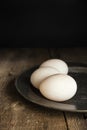 Fresh duck eggs in moody vintage retro style natural lighting se