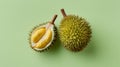 Fresh durian fruit halves on a light green background for a vibrant display Royalty Free Stock Photo