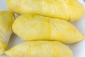 Fresh durian fruit placed on a white plate. Durian the king of fruits The yellow color is on the white plate. Ripe durian tropical Royalty Free Stock Photo