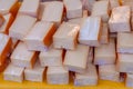 Fresh Dutch Bio Cheese blocks on sale Royalty Free Stock Photo