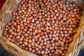 Ecological hazelnuts in a wicker basket for sale at farmer\'s market, autumn harvest, healthy food