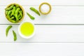 Fresh edamame and oil on white wooden background top view mock up Royalty Free Stock Photo