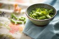 fresh edamame spread on linen cloth, natural daylight Royalty Free Stock Photo