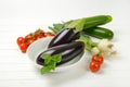 Fresh eggplants, tomatoes, zucchini and spring onion Royalty Free Stock Photo