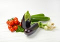 Fresh eggplants, tomatoes, zucchini and spring onion Royalty Free Stock Photo