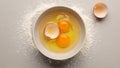 Fresh Eggs and Flour Ready for Baking on a Grey Background Royalty Free Stock Photo