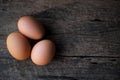 Fresh eggs on old wooden background Rustic style Royalty Free Stock Photo