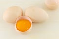 Fresh eggs with one broken Royalty Free Stock Photo