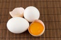 Fresh eggs with one broken Royalty Free Stock Photo