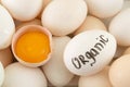 Fresh eggs with one broken Royalty Free Stock Photo