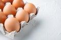 Fresh eggs on paper egg box, on white background , with space for text  copyspace Royalty Free Stock Photo