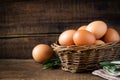 Fresh eggs in a willow basket