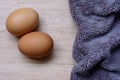 Fresh eggs on wooden and Microfiber Cloth Royalty Free Stock Photo