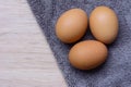 Fresh eggs on wooden and Microfiber Cloth Royalty Free Stock Photo