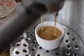 Fresh morning espresso from coffee machine close up Royalty Free Stock Photo