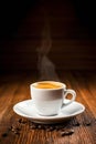 Fresh espresso cup of coffee with hot steam Royalty Free Stock Photo