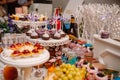 Fresh, exotic, organic fruits, light snacks in a plate on a buffet table. Assorted mini delicacies and snacks, restaurant food at Royalty Free Stock Photo