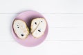 Fresh exotic tropical fruit. Two halfs of custard apple isolated on white background, annona cherimoya. Royalty Free Stock Photo