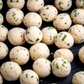 fresh falafel balls on a black background - a savory and appetizing culinary composition