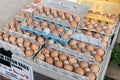 Fresh farm brown eggs at local farmers market Royalty Free Stock Photo