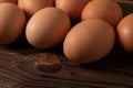 Fresh farm eggs on a wooden rustic background Royalty Free Stock Photo
