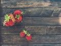 Fresh farmerÃ¢â¬â¢s organic strawberries in tiny metal vintage basket on wooden background top view Royalty Free Stock Photo