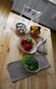 Fresh farmers tomatoes and basil on wood table. Royalty Free Stock Photo