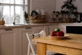 Fresh farmers tomatoes and basil on wood table. Royalty Free Stock Photo