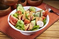 Fresh Fattoush Salad with tomato, cucumber and green leaf served in bowl isolated on table side view of middle east food