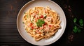 Fresh-Fettuccini pasta with prawn and mushroom tomatoes food photography white plate dark background