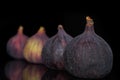 Fresh fig fruit isolated on black glass Royalty Free Stock Photo