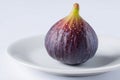 Fresh fig on white ceramic plate Royalty Free Stock Photo