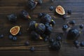 Fresh figs and blueberries on the wooden table Royalty Free Stock Photo