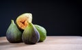 Fresh figs on a dark slate table with black background Royalty Free Stock Photo