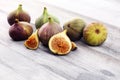 Fresh figs. Food Photo. whole and sliced figs on rustic background Royalty Free Stock Photo