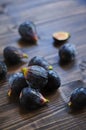 Fresh figs on a rustic dark wooden table Royalty Free Stock Photo