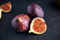 Fresh Figs slice on black stone board Royalty Free Stock Photo