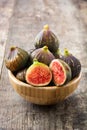 Fresh figs on wooden table Royalty Free Stock Photo