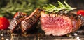 Fresh fillet steak on wooden board closeup