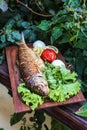Fresh Fish and Assorted Vegetables on Cutting Board Royalty Free Stock Photo