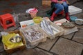 Fresh fish in baskets on a local street market, China