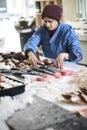 Fresh fish and clams presentated by the fishdealer Royalty Free Stock Photo