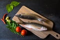 Fresh fish display on a wooden platter Royalty Free Stock Photo