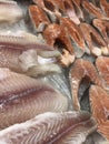 Fresh fish fillets and steaks on the market Royalty Free Stock Photo