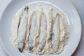 Fresh fish in a plate with flour Royalty Free Stock Photo