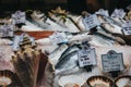 Fresh fish on sale at a fishmonger stall in Borough Market, London, UK. Royalty Free Stock Photo